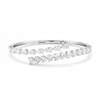 My Store 4 bypass open bangle bracelet in white gold featuring alternating pear and heart cut diamonds.