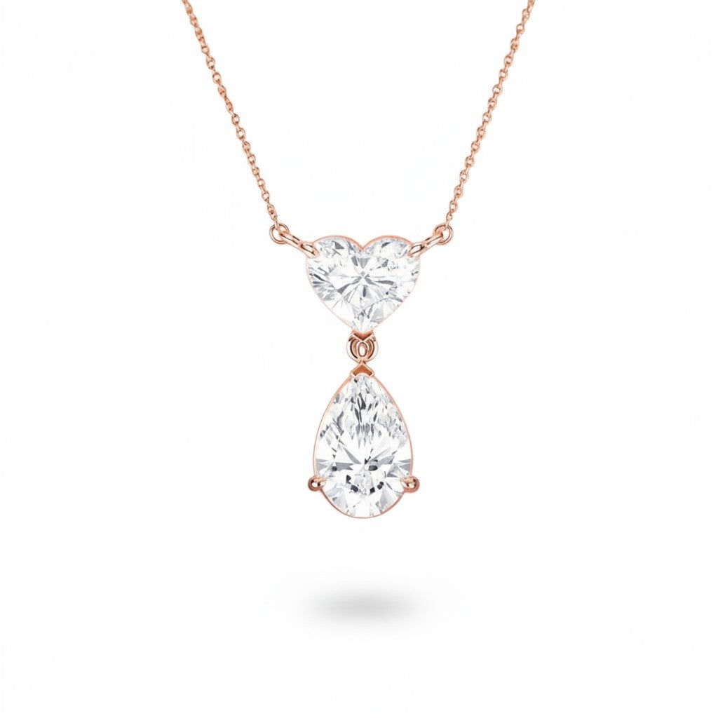 My Store 4 pear and heart diamond drop pendant necklace in 18K gold with articulated link and chevron V-prongs.