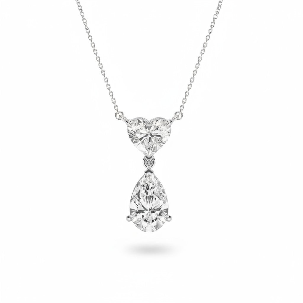 My Store 4 pear and heart diamond drop pendant necklace in white gold with a delicate cable chain.