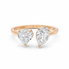 My Store 4 18K solid gold Toi et Moi ring featuring a pear-cut and heart-cut lab-grown diamond on a polished band.