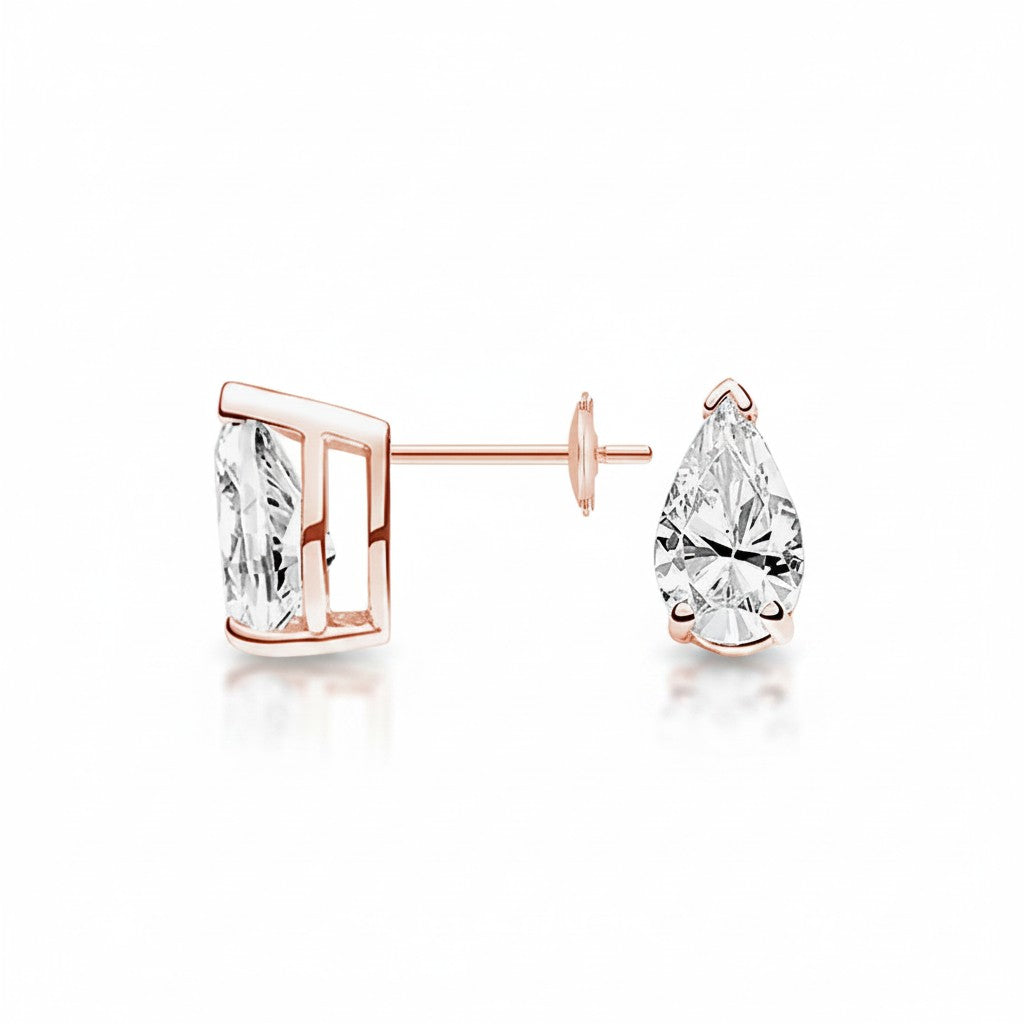 My Store 4 18K solid gold stud earrings featuring 2 carat pear-cut lab-grown diamonds with a polished finish.