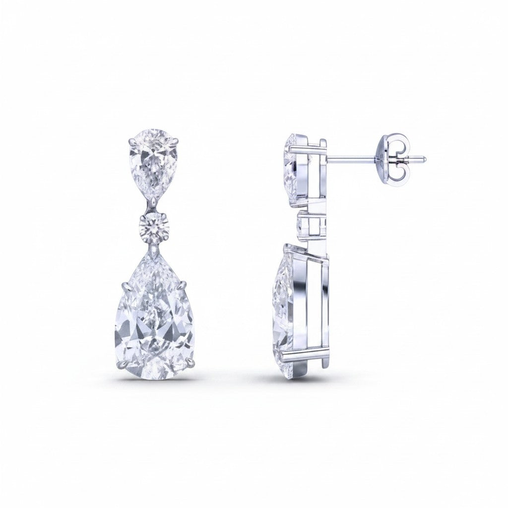 My Store 4 pear and marquise diamond drop earrings in 18K white gold featuring articulated pear-cut pendants.
