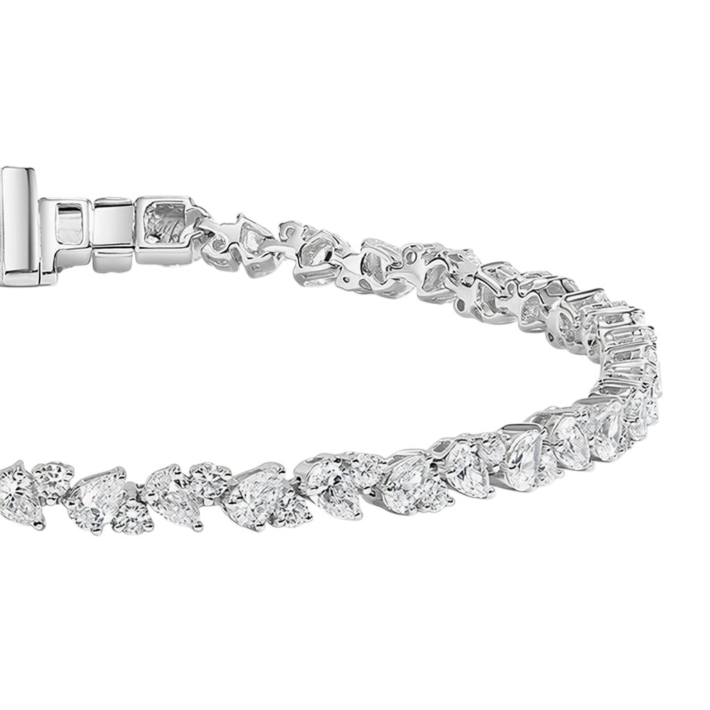 My Store 4 tennis bracelet featuring alternating pear-cut and round-cut diamonds set in polished white gold.