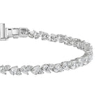 My Store 4 tennis bracelet featuring alternating pear-cut and round-cut diamonds set in polished white gold.