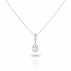 My Store 4 three-stone diamond drop necklace in 18K white gold featuring pear and round cut stones on a cable chain.