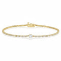 My Store 4 yellow gold tennis bracelet featuring a continuous line of round diamonds and a central pear-cut diamond.