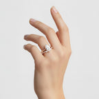 My Store 4 pear cut solitaire engagement ring with a marquise and round diamond contour band in 18K yellow gold.