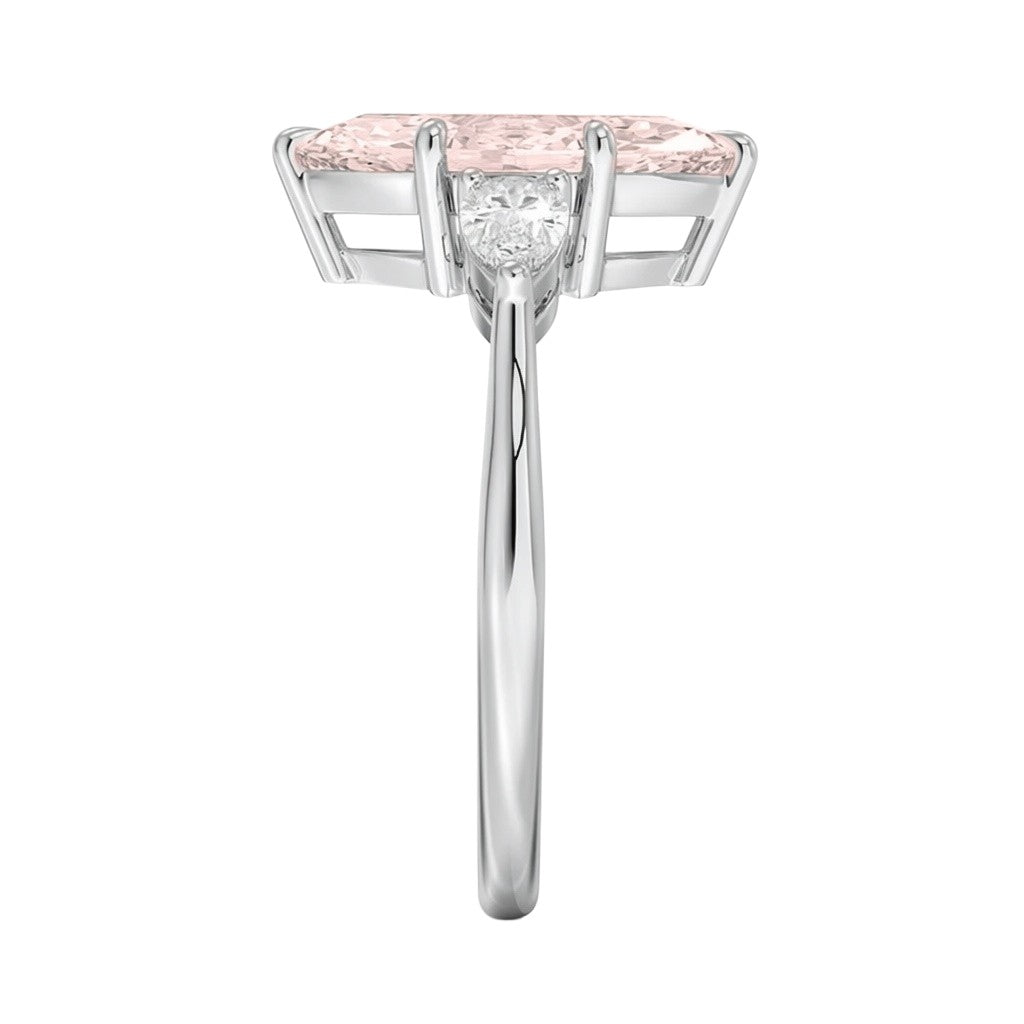 My Store 4 18K solid gold three-stone engagement ring with a pear-cut lab-grown diamond, side view.