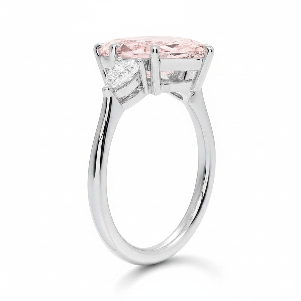 My Store 4 18K solid gold three-stone engagement ring with a pear-cut lab-grown diamond on a polished gold band