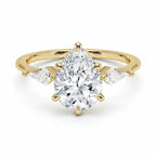 My Store 4 three-stone engagement ring with a pear-cut center diamond and pear side accents in 18K yellow gold.