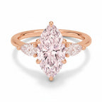 My Store 4 18K solid gold three-stone engagement ring featuring a pear-cut lab-grown diamond in a polished gold band.