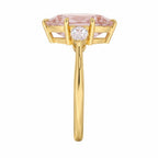 My Store 4 18K solid gold three-stone engagement ring featuring a pear-cut lab diamond in a side profile view.