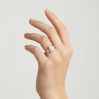 My Store 4 three-stone engagement ring featuring a pear-cut center diamond and pear side accents on a gold band.
