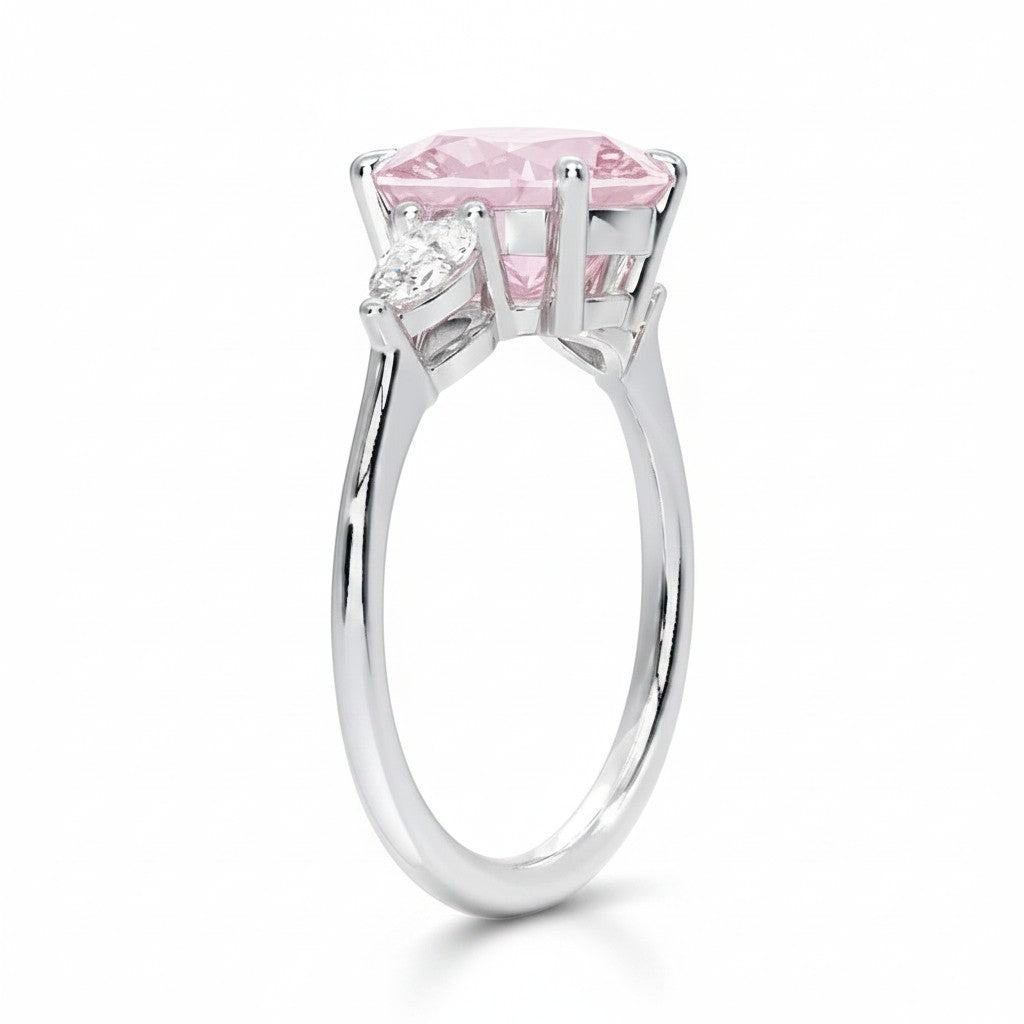 My Store 4 18K gold trilogy engagement ring featuring a pear-cut lab-grown diamond with pear side stones