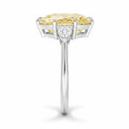 My Store 4 18K solid gold trilogy ring featuring a pear-cut fancy yellow diamond with side stones, side profile view.