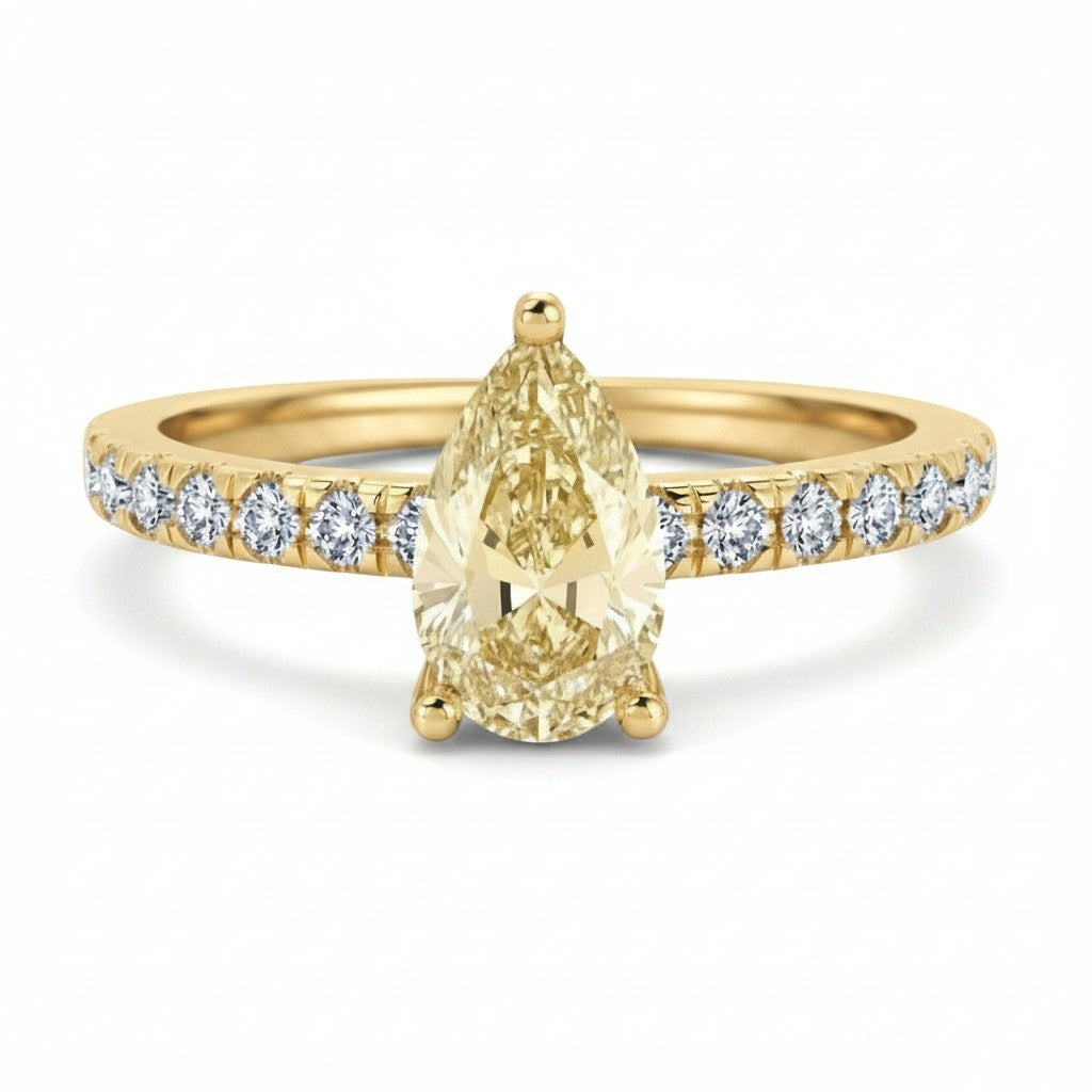 My Store 4 18K solid yellow gold ring featuring a pear-cut fancy yellow diamond with pavé-set diamond accents.