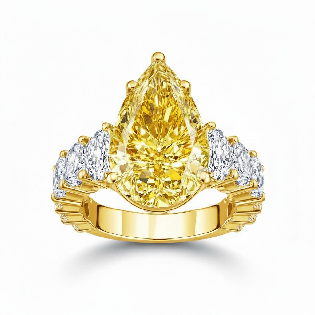 My Store 4 18K solid gold engagement ring featuring a large pear-cut fancy yellow lab diamond with side stones
