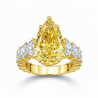 My Store 4 18K solid gold engagement ring featuring a large pear-cut fancy yellow lab diamond with side stones