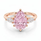 My Store 4 18K solid gold ring featuring a pear-cut pink fancy color diamond with heart-shaped side diamonds