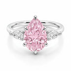 My Store 4 18K solid gold ring featuring a pear-cut pink fancy color diamond with sparkling side accent diamonds.