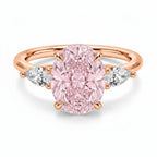 My Store 4 18K solid gold trilogy engagement ring featuring a central pink oval diamond and pear-cut side diamonds.