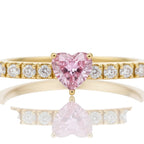 My Store 4 gold tennis bracelet featuring a central pink heart-cut diamond flanked by round brilliant white diamonds.