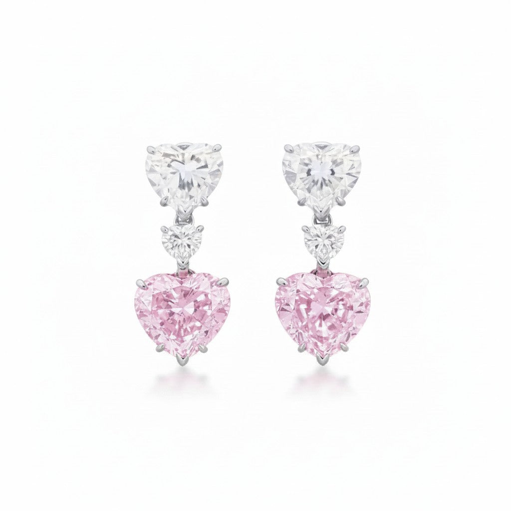 My Store 4 drop earrings featuring white diamond tops and fancy pink heart-cut diamond teardrops in 18K white gold.