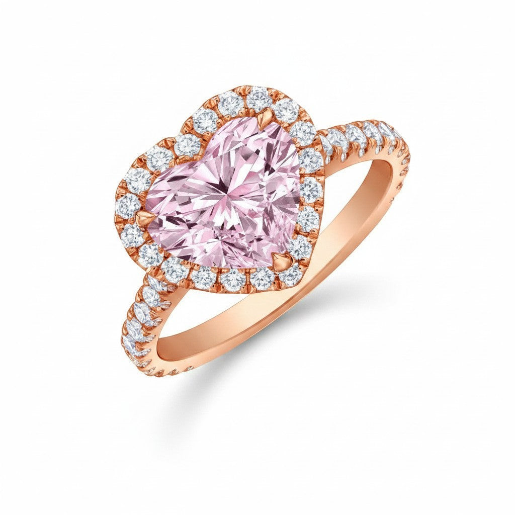 My Store 4 18K solid gold ring featuring a pink heart-cut lab-grown diamond with a sparkling diamond halo setting.