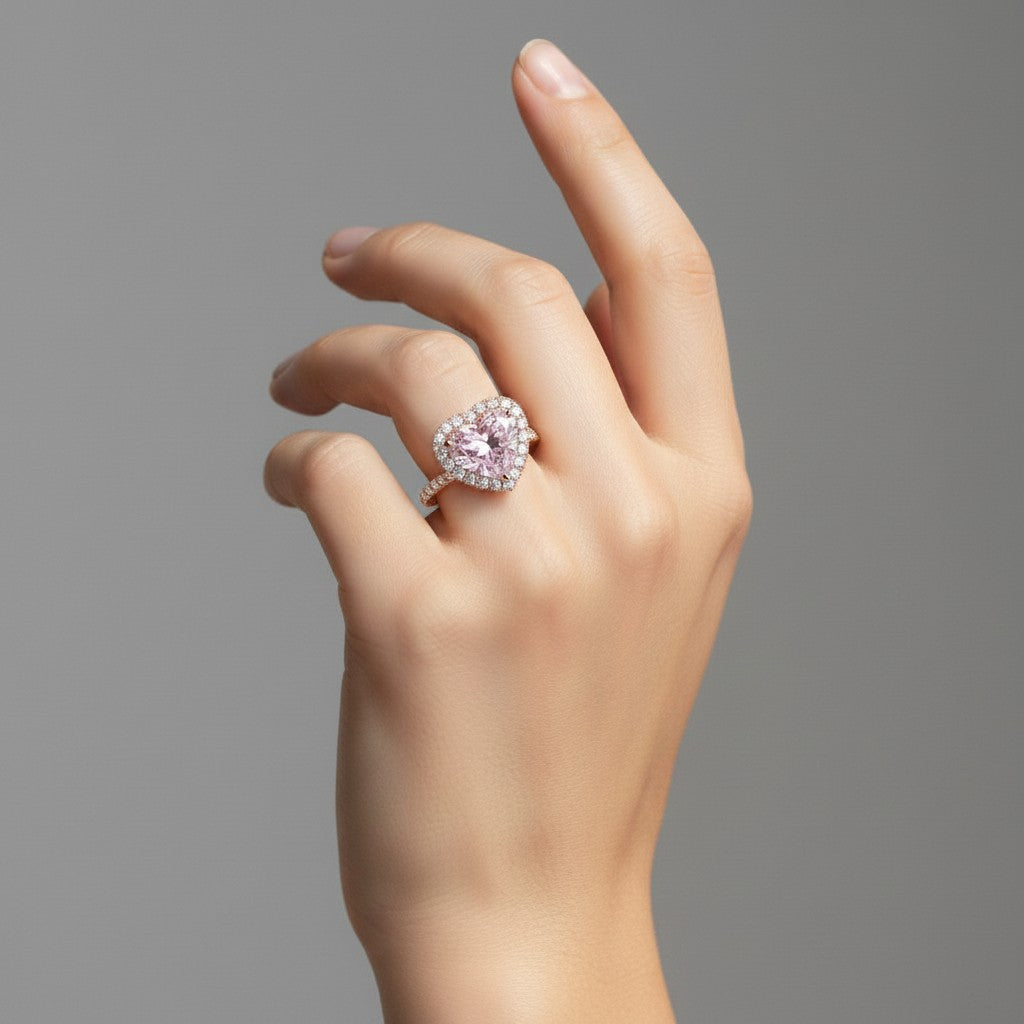 My Store 4 18K solid gold ring featuring a pink heart-cut lab-grown diamond with a sparkling halo setting on a finger