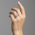 My Store 4 18K solid gold ring featuring a pink heart-cut lab-grown diamond with a sparkling halo setting on a finger