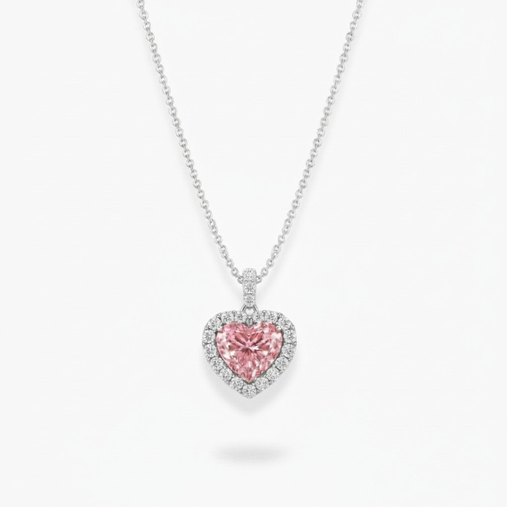 My Store 4 fancy pink heart-cut diamond pendant necklace with a white diamond halo on an 18K white gold cable chain.