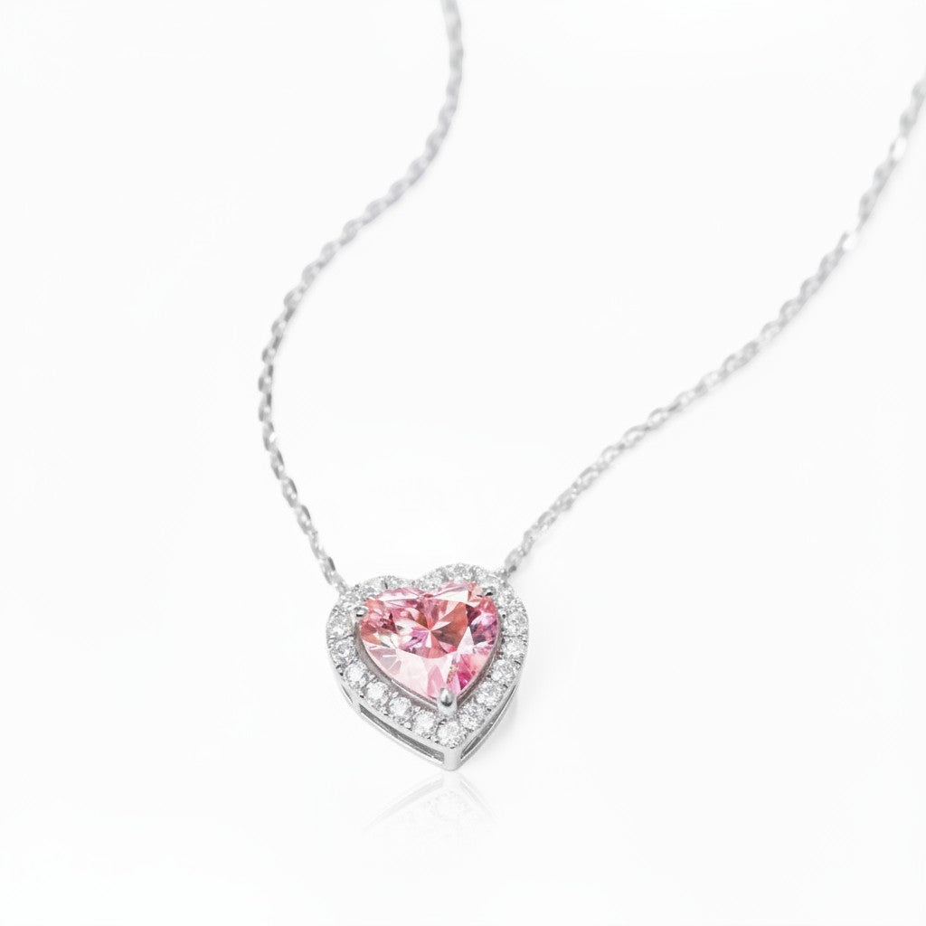 My Store 4 fancy pink heart-cut diamond pendant necklace with a white diamond halo set in 18K white gold
