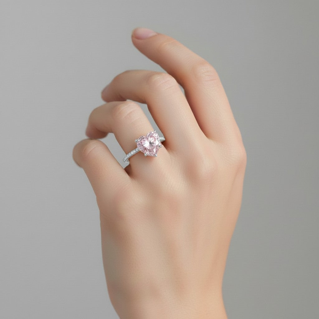 My Store 4 18K solid gold ring featuring a pink heart-cut lab-grown diamond with pavé-set stones on a woman's finger