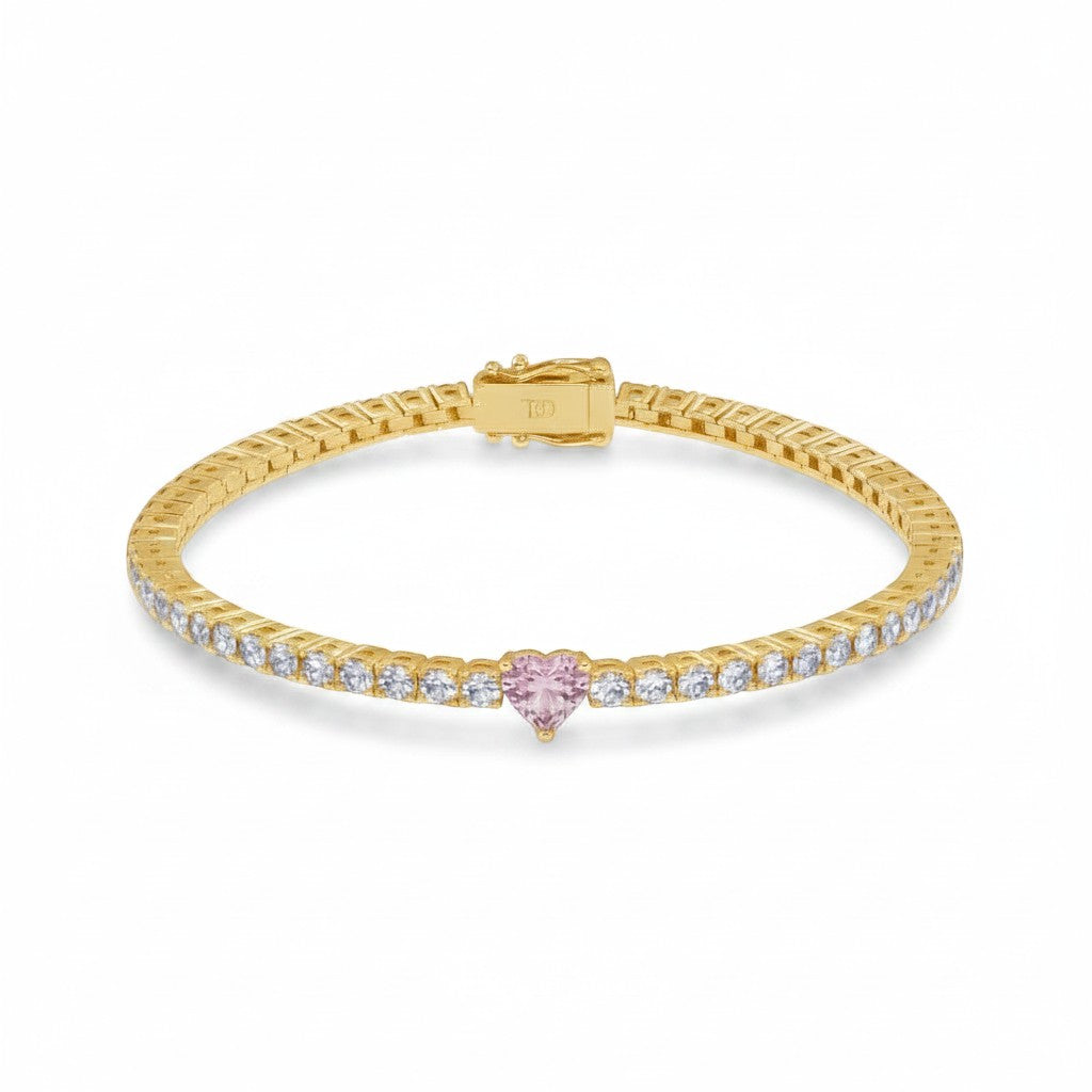My Store 4 gold tennis bracelet featuring a central pink heart-cut diamond and round white diamond accents.