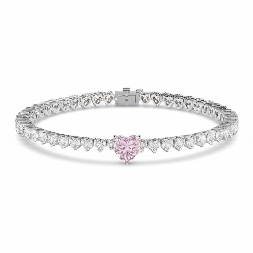 My Store 4 tennis bracelet featuring a central pink heart-cut diamond surrounded by white heart-cut diamonds in gold.