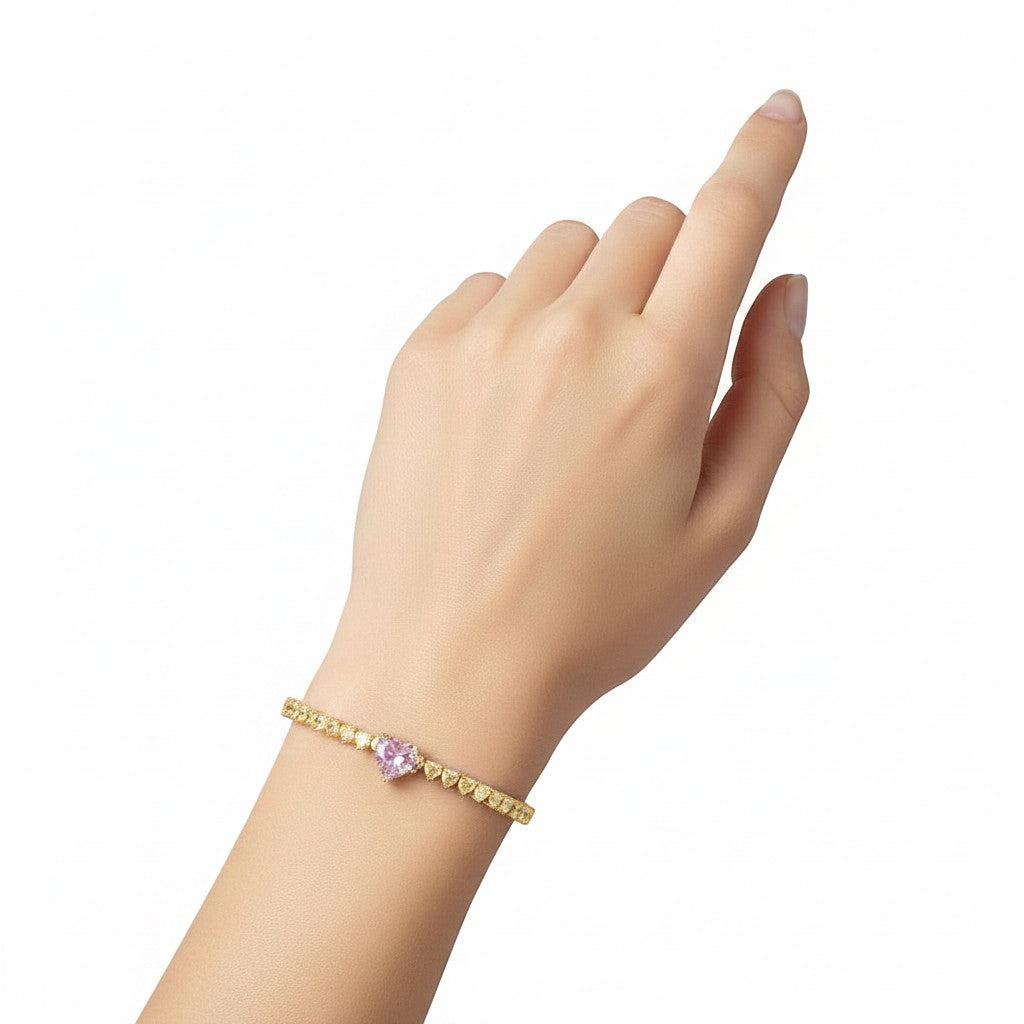 My Store 4 tennis bracelet featuring a central pink heart-cut diamond surrounded by white heart-cut diamonds in gold