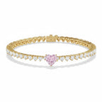 My Store 4 tennis bracelet featuring a central pink heart-cut diamond surrounded by white heart-cut diamonds in gold