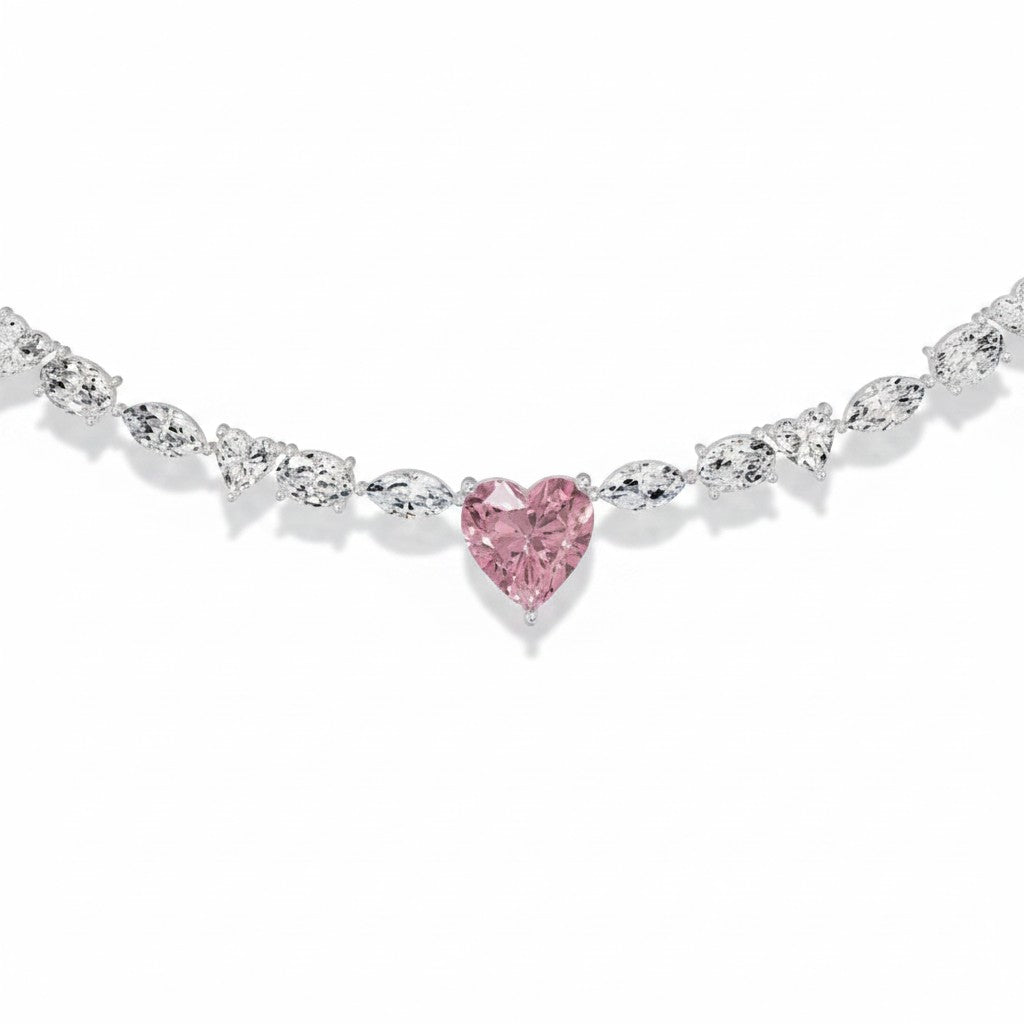 My Store 4 tennis necklace featuring a fancy pink heart-cut diamond center with alternating marquise and round diamonds.