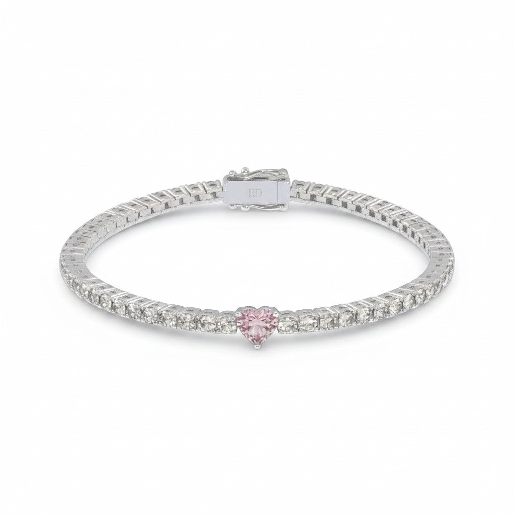 My Store 4 tennis bracelet featuring a central pink heart-cut diamond surrounded by round white diamonds in gold