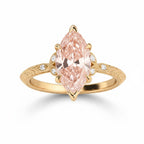 My Store 4 18K solid gold engagement ring featuring a fancy pink marquise-cut lab diamond with intricate band detail.
