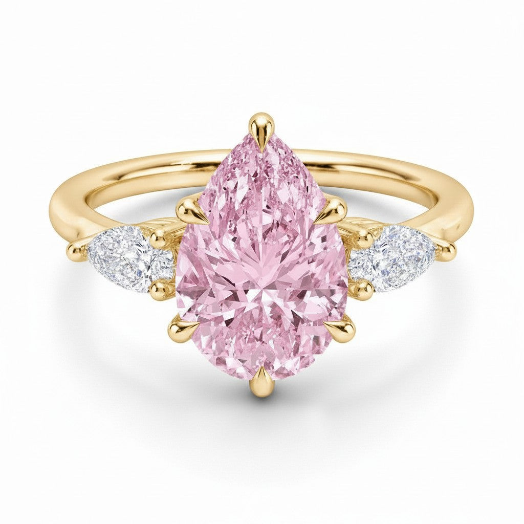 My Store 4 18K solid gold ring featuring a pink oval-cut fancy diamond flanked by heart-shaped side diamonds.
