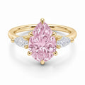 My Store 4 18K solid gold ring featuring a pink oval-cut fancy diamond flanked by heart-shaped side diamonds.