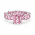 My Store 4 18K solid gold eternity ring featuring radiant-cut fancy pink lab-grown diamonds in a prong setting.