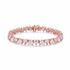 My Store 4 tennis bracelet featuring alternating fancy pink and white heart-cut diamonds set in rose gold.