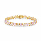My Store 4 tennis bracelet featuring alternating pink and white heart-cut diamonds in gold 3-prong settings.