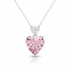 My Store 4 Toi et Moi pendant necklace featuring a white heart diamond above a large fancy pink heart diamond in gold.