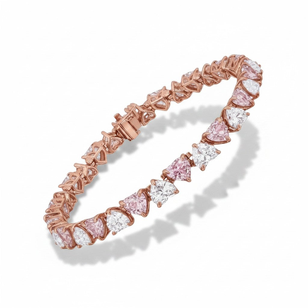 My Store 4 tennis bracelet featuring alternating pink and white heart-cut stones set in polished rose gold links.