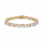 My Store 4 tennis bracelet featuring alternating pink and white heart-cut stones set in polished yellow gold.