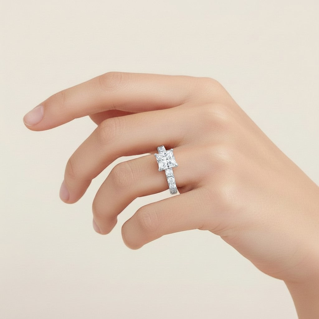 My Store 4 18K solid gold princess-cut lab diamond engagement ring set with pavé band worn on a woman's finger
