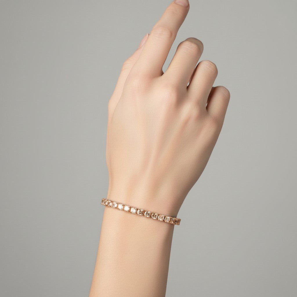 My Store 4 custom princess cut diamond tennis bracelet in rose gold worn on a woman's wrist